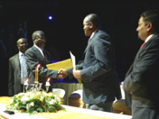 Harrison Kalua, President of Association of SADC Chambers of Commerce and Industry, with Denis Kadima, Chairperson of the Southern Africa Trust, after the two organisations signed a memorandum of understanding in 2007